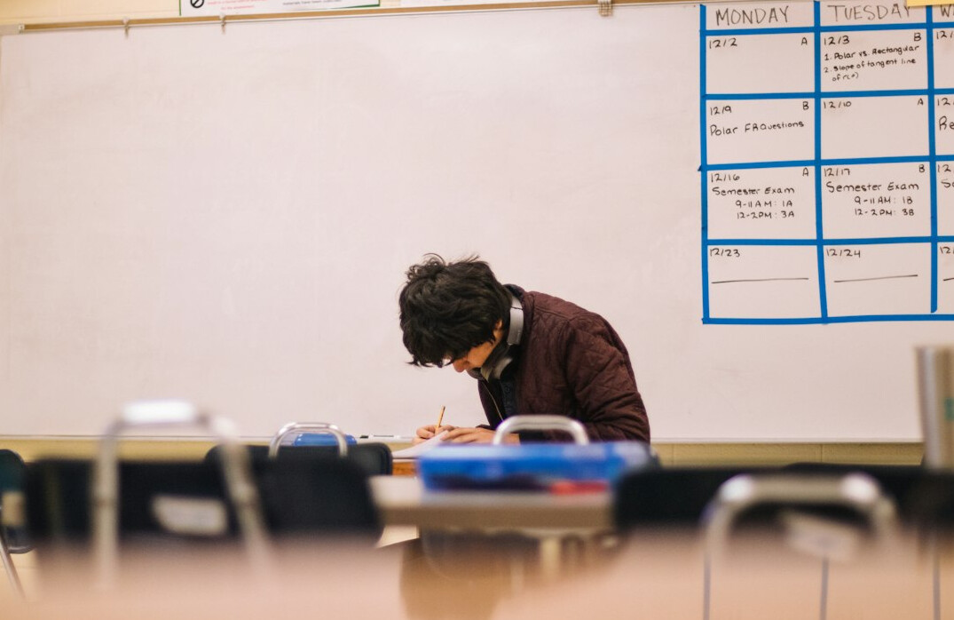 person studying at desk